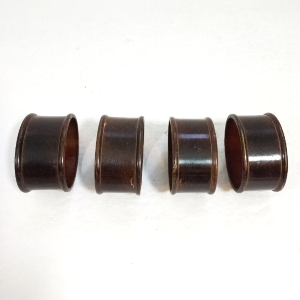 Bronze metal 4 piece napkin rings set